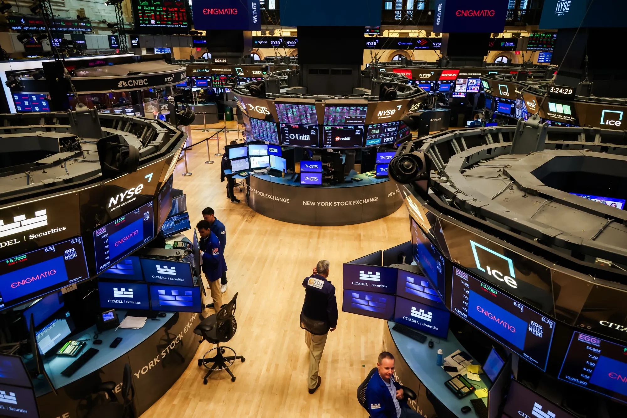 Traders work on the floor of the New York Stock Exchange.