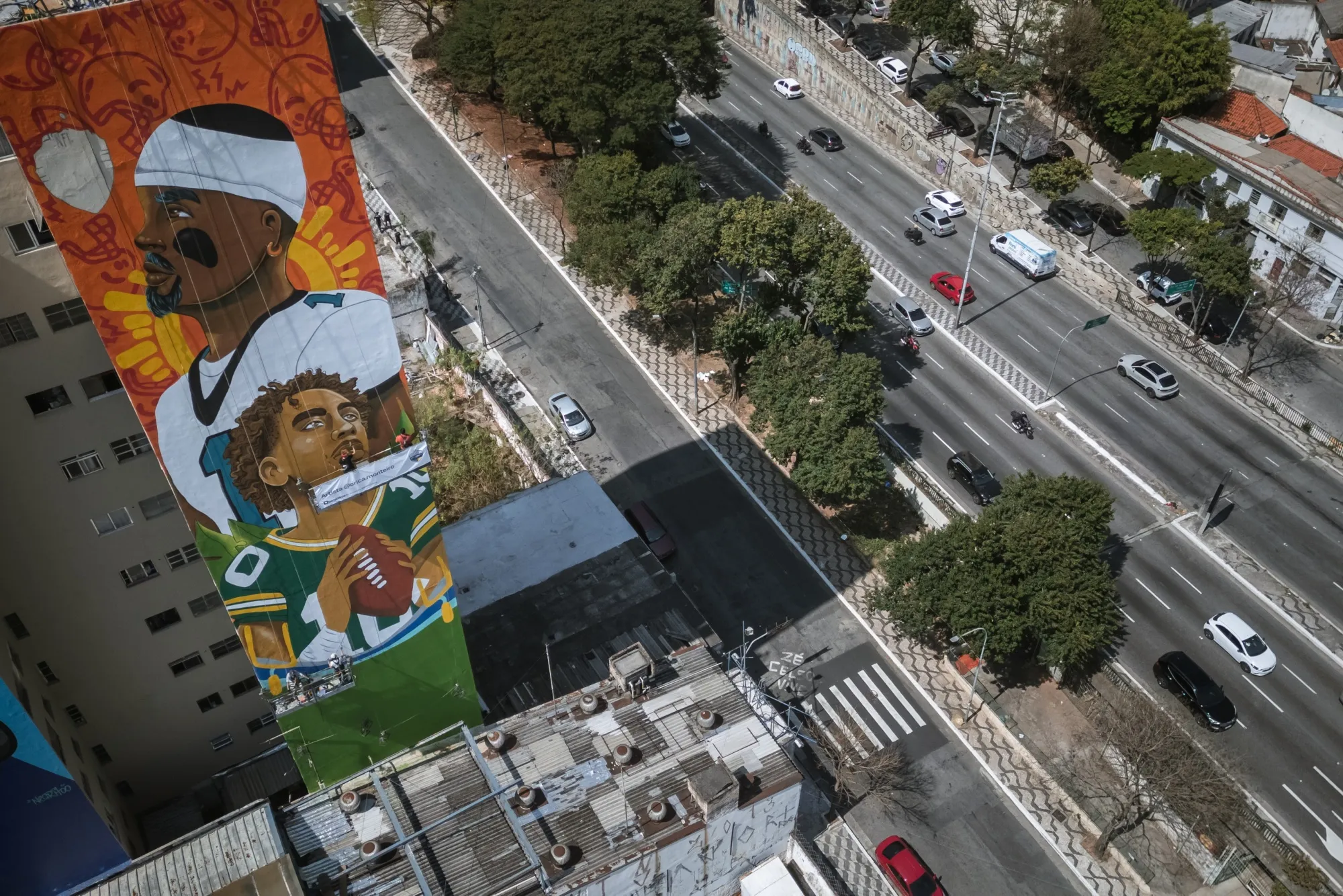 A mural of Philadelphia Eagles quarterback Jalen Hurts and Green Bay Packers quarterback Jordan Love in Sao Paulo, Brazil. The NFL is hosting its first game in South America, where football dominates and the American version is a niche sport.
