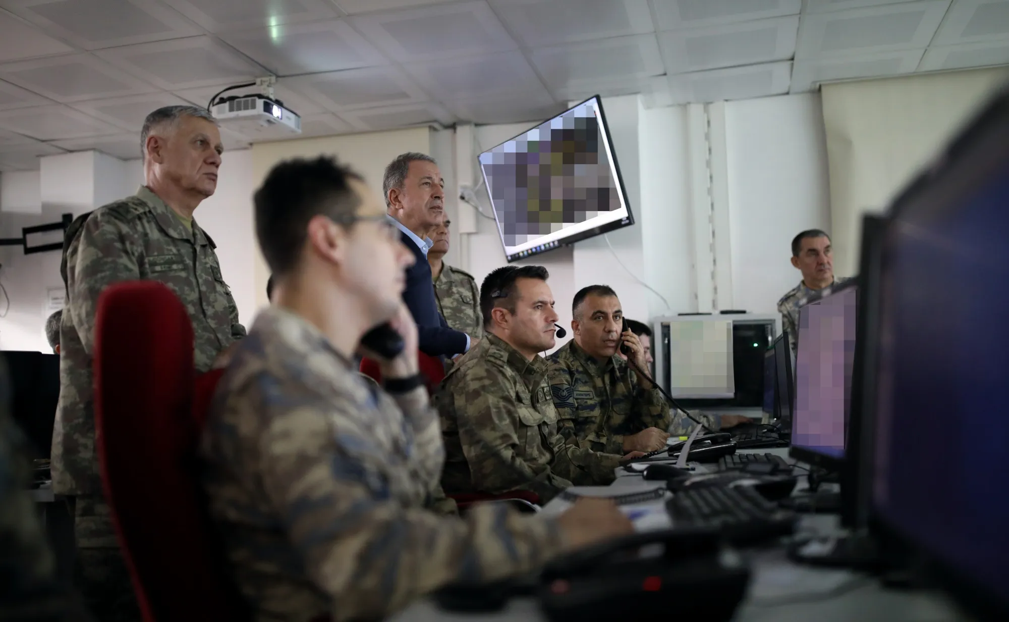 Turkish Defense Minister Hulusi Akar inspects operations in Idlib from a command center in Turkey, on Feb. 28.