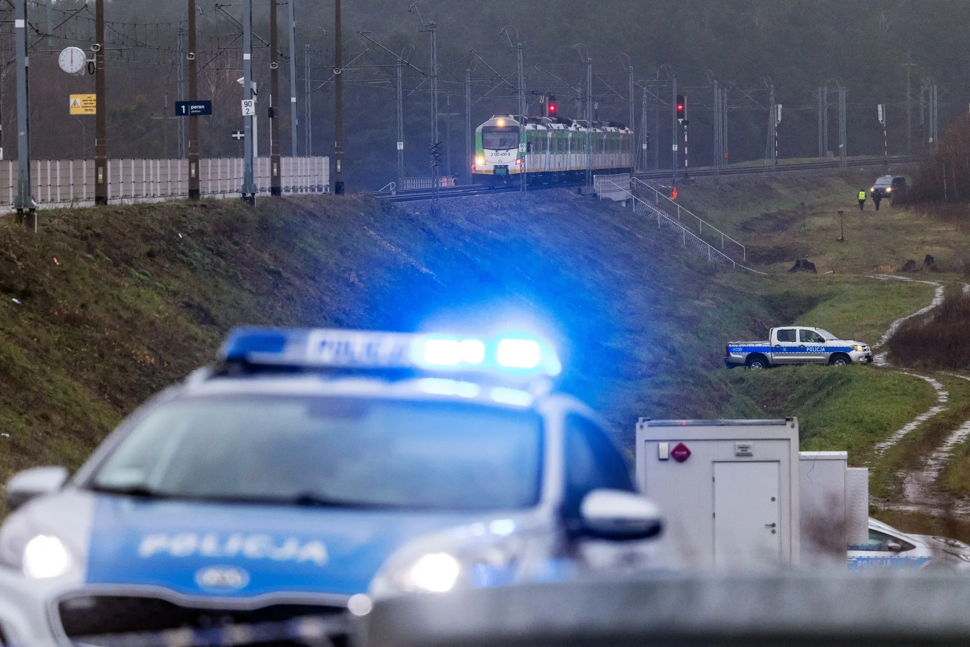 Police cars near the railway&nbsp;damaged in an explosion&nbsp;in Mika, Poland, on Nov. 17.
