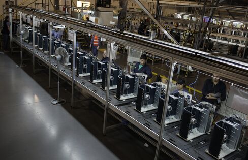 Workers at the Newsan factory.