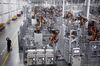 Robots weld car body components for vehicles at the Bayerische Motoren Werke AG (BMW) Manufacturing Co. assembly plant in Greer, South Carolina, U.S. on Thursday, May 10, 2018. Markit is scheduled to release manufacturing figures on May 23.