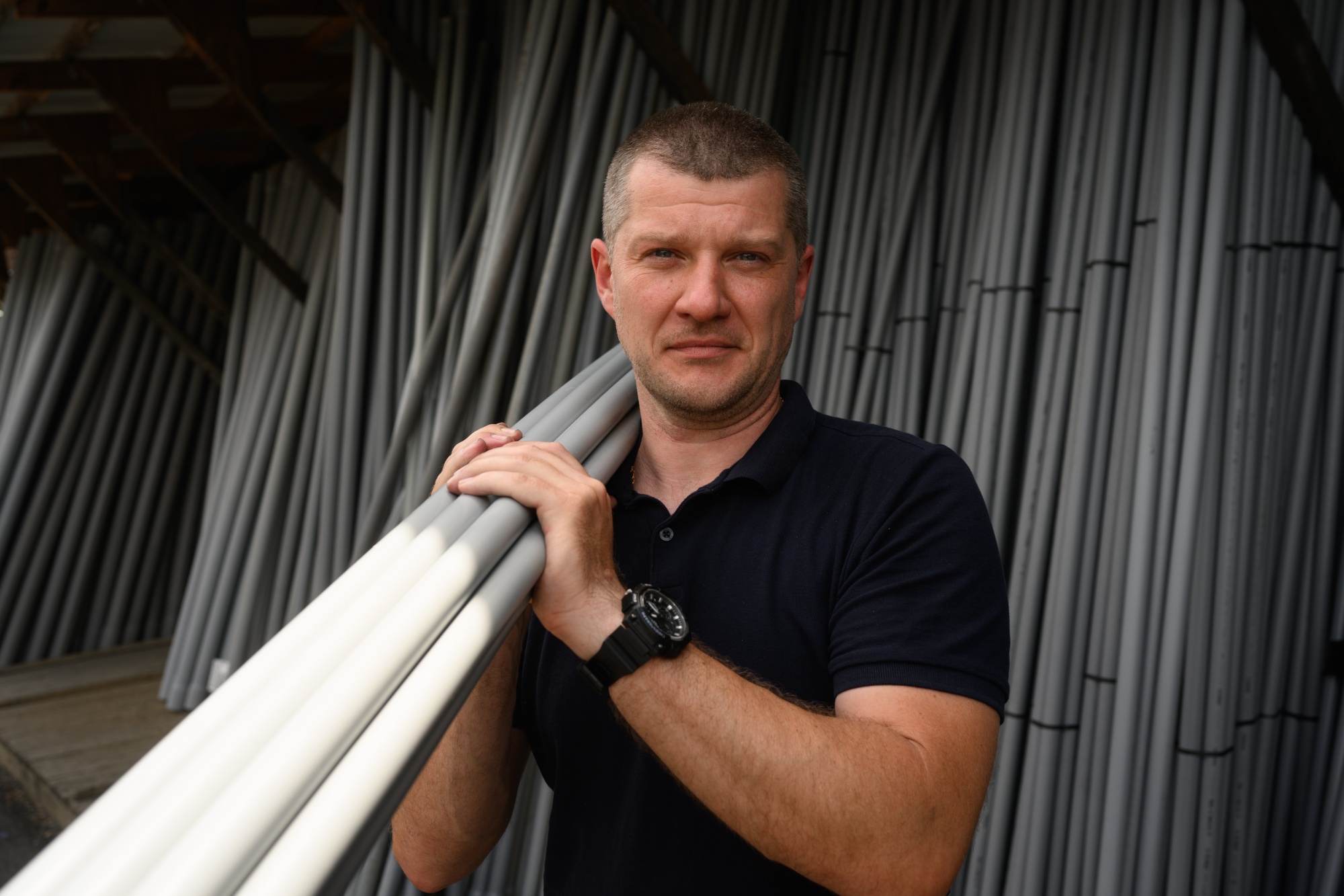 Andrii Babak, a Ukrainian who moved to Greensburg in 2023 from New Jersey as part of the dioceses resettlement program, is photographed at Scott Electric, where the diocese got him a job in Greensburg, Pa., Westmoreland County on June 4, 2024.