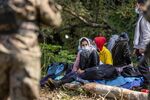 Migrants believed to be from Afghanistan&nbsp;in the village of Usnarz Gorny near Bialystok, Poland, close to the border with Belarus, on Aug.&nbsp;20.&nbsp;