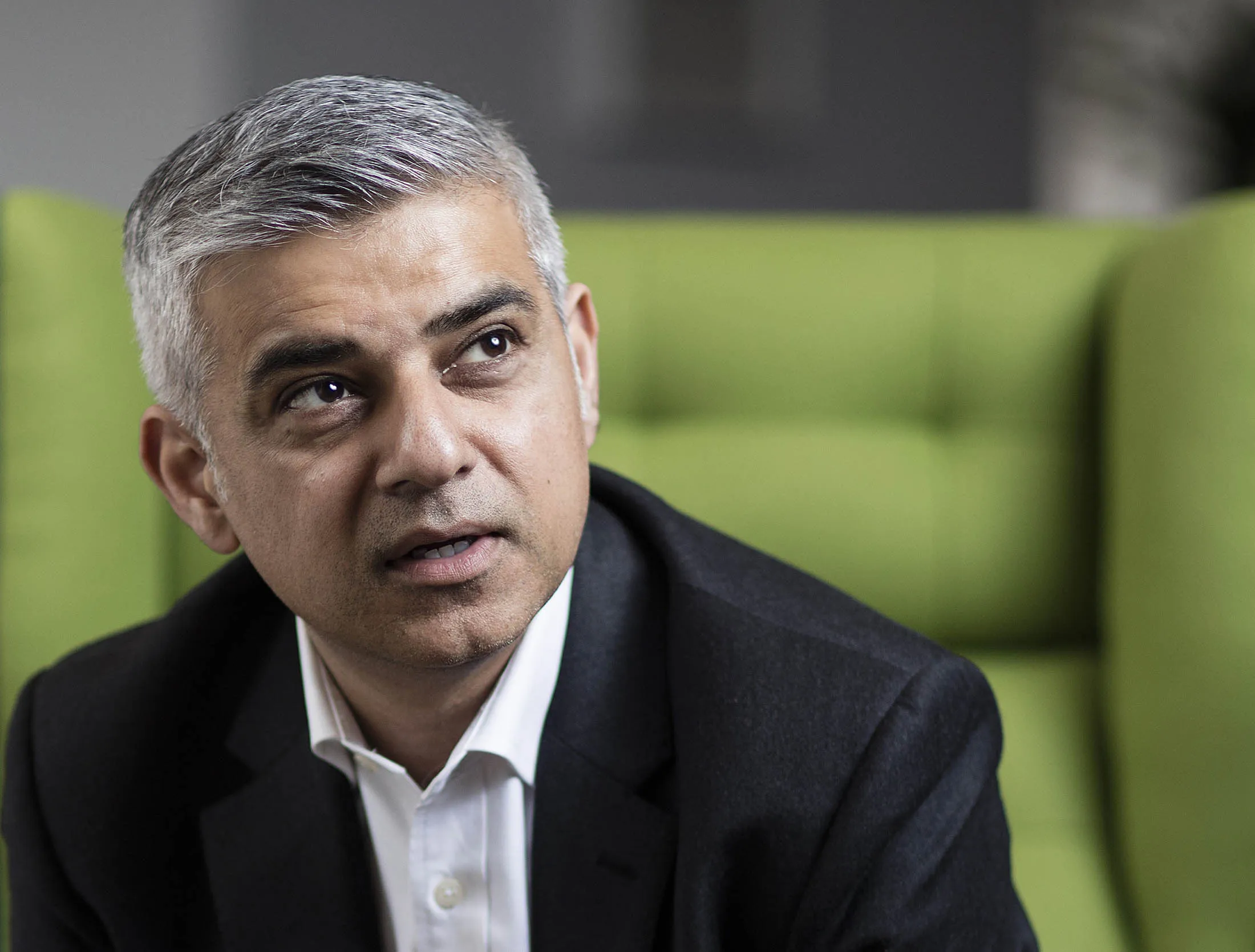 Sadiq Khan, the Labour Party candidate for London mayor, poses for a photograph following a Bloomberg Television interview at the U.K. headquarters of Twitter Inc. in London, U.K., on Thursday, April 7, 2016. Khan, who is leading Conservative candidate Zac Goldsmith in opinion polls for the May 5 election, has pledged to freeze transport fares, ensure there is more affordable housing and support business as he seeks to regain the mayoralty for Labour, which lost it to Boris Johnson in 2008.
