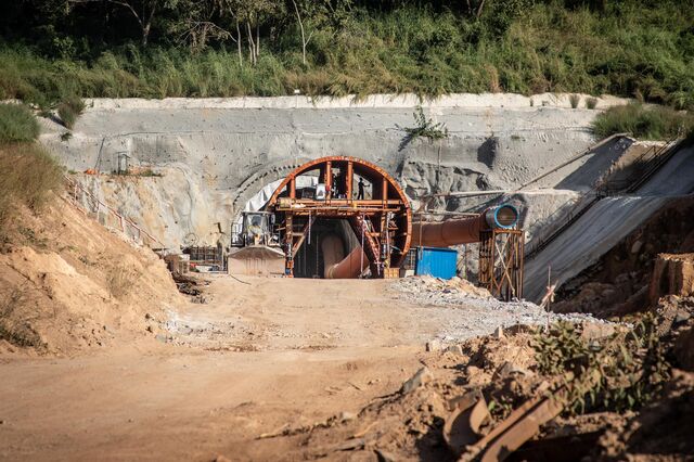 A Chinese construction company is blasting through a mountainous area near the Sierra Leone border for a planned 400-mile railway.