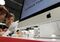 Customers test Apple iPad 2 on display at an Eldorado Group electronics store in Moscow on Aug. 25, 2011