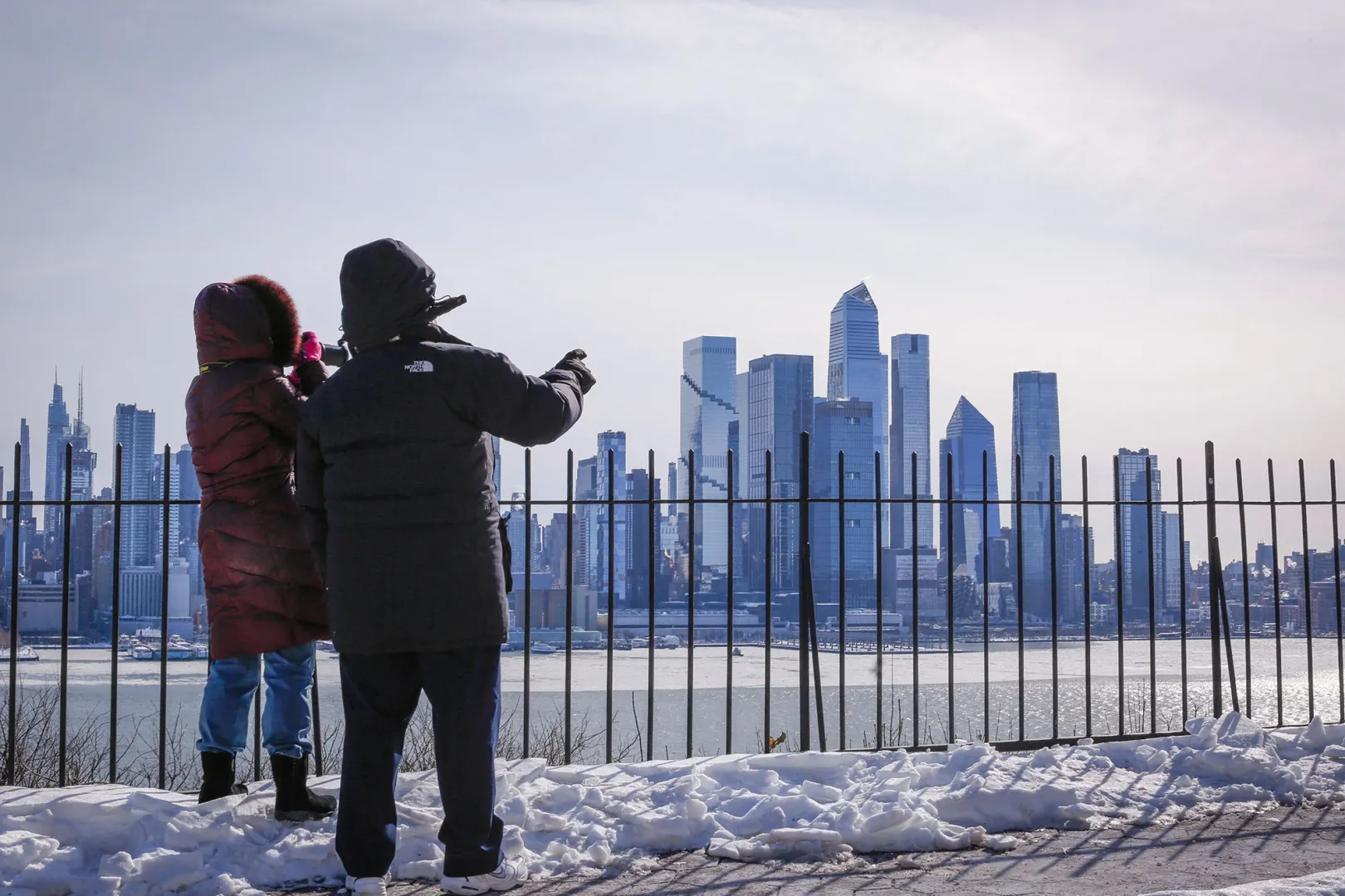 People look at the New York skyline from Weehawken, New Jersey&nbsp;on Feb. 1.&nbsp;