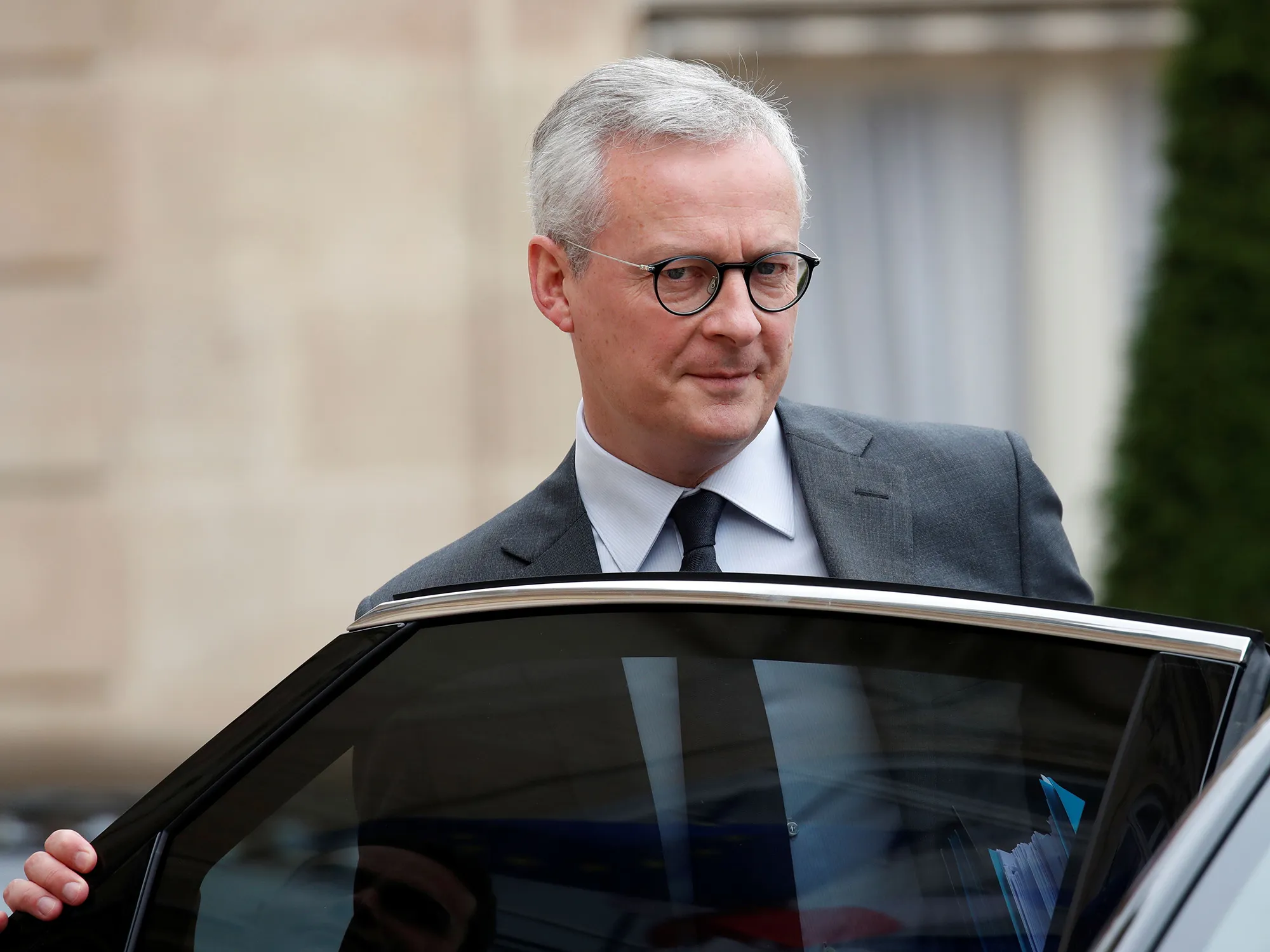 Bruno Le Maire leaves the Elysee Palace in Paris on June 17.