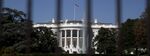 The south side of the White House stands past a fence in Washington, D.C.