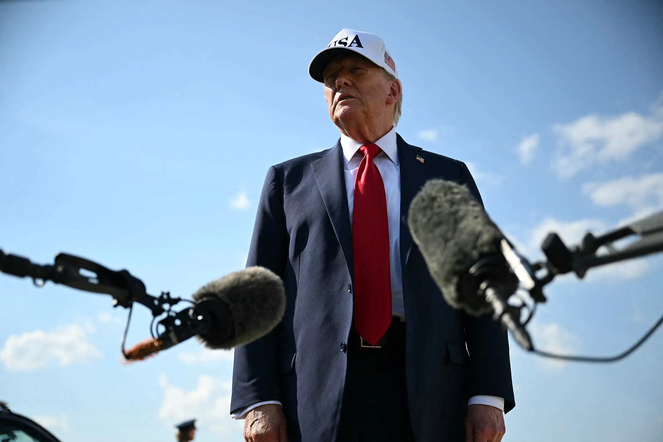 US President Donald Trump speaks to reporters at Joint Base Andrews in Maryland&nbsp;on July 3.