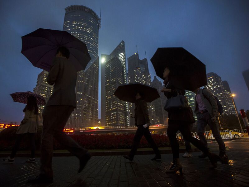 Commuters in the Pudong Business Area of Shanghai as Plenum Concludes