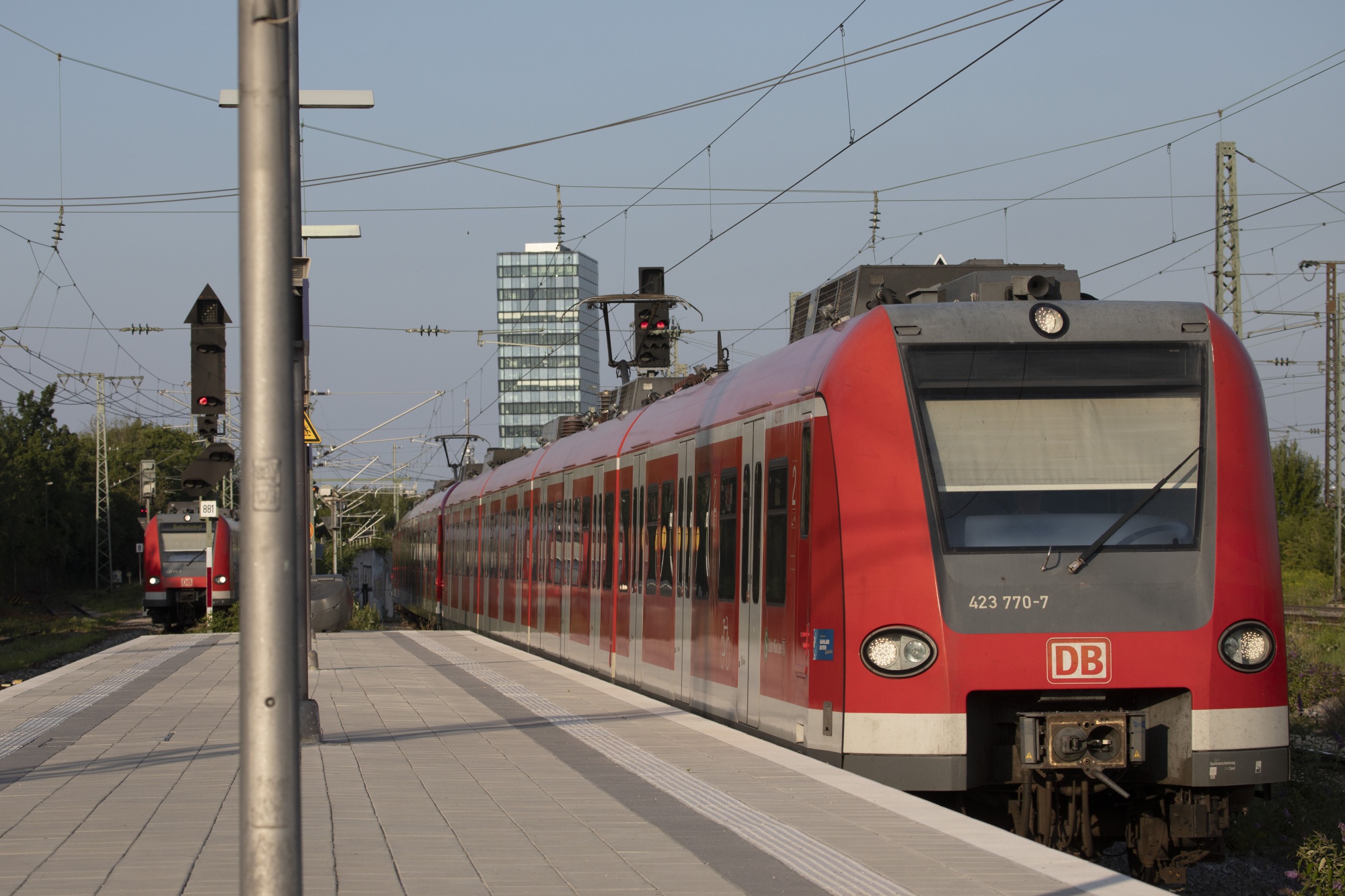 A Deutsche Bahn AG train&nbsp;approaches a&nbsp;station in Trudering, Munich.