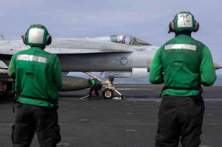 An F/A-18E Super Hornet prepares to launch from the USS Abraham Lincoln aircraft carrier in June.