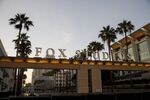 Signage is displayed outside the entrance to 20th Century Fox Studios in the Century City neighborhood of Los Angeles, California.