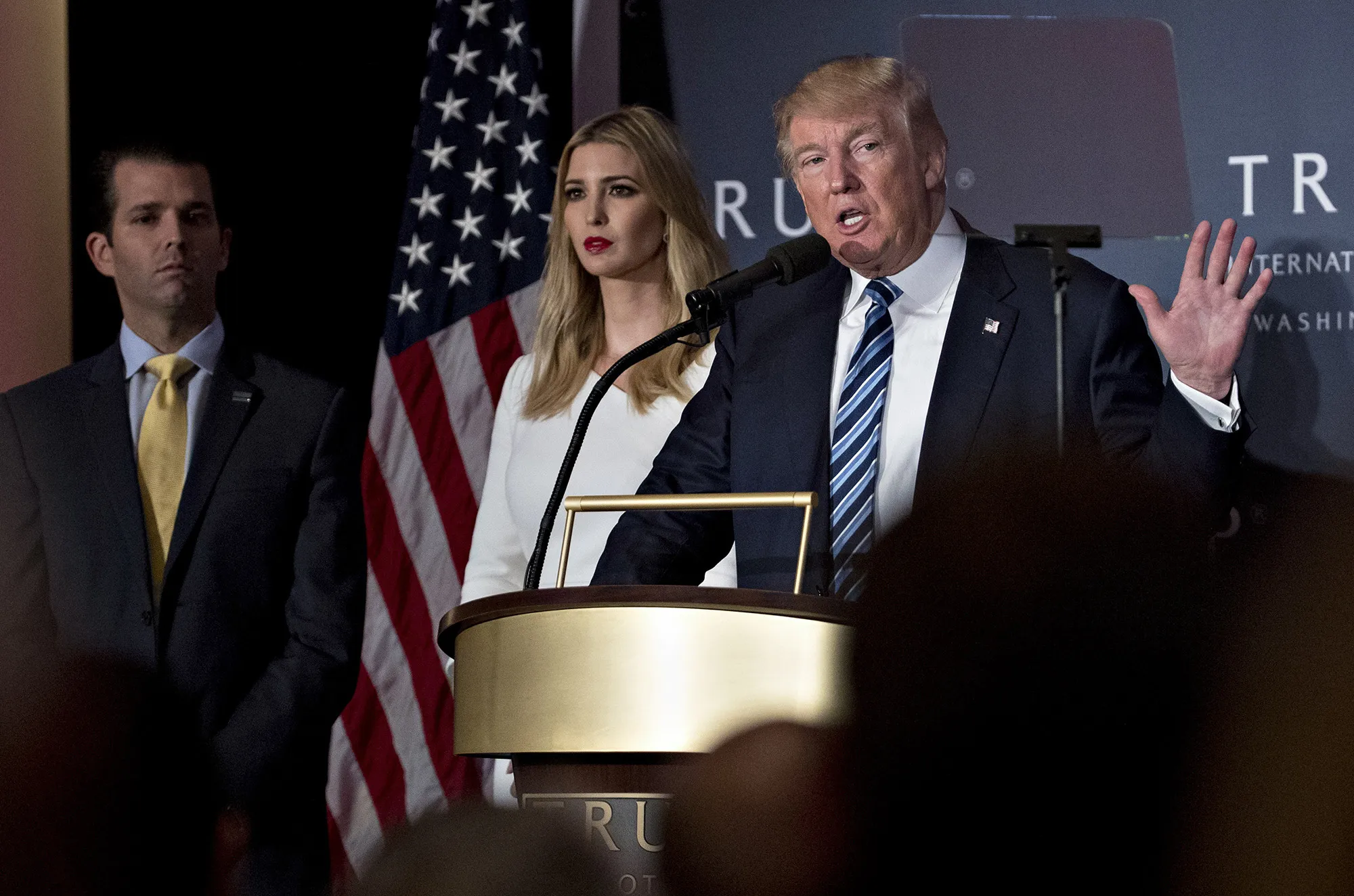 Donald Trump speaks as his daughter Ivanka Trump and son Donald Trump Jr., left, listen during a ceremony in Washington, D.C., in 2016.