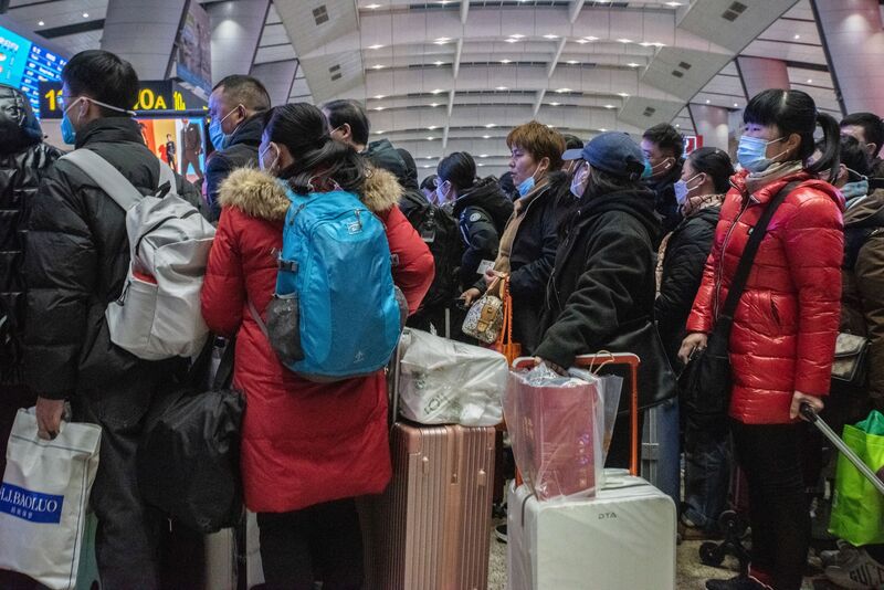 Travelers at Railway Stations Ahead of Lunar New Year