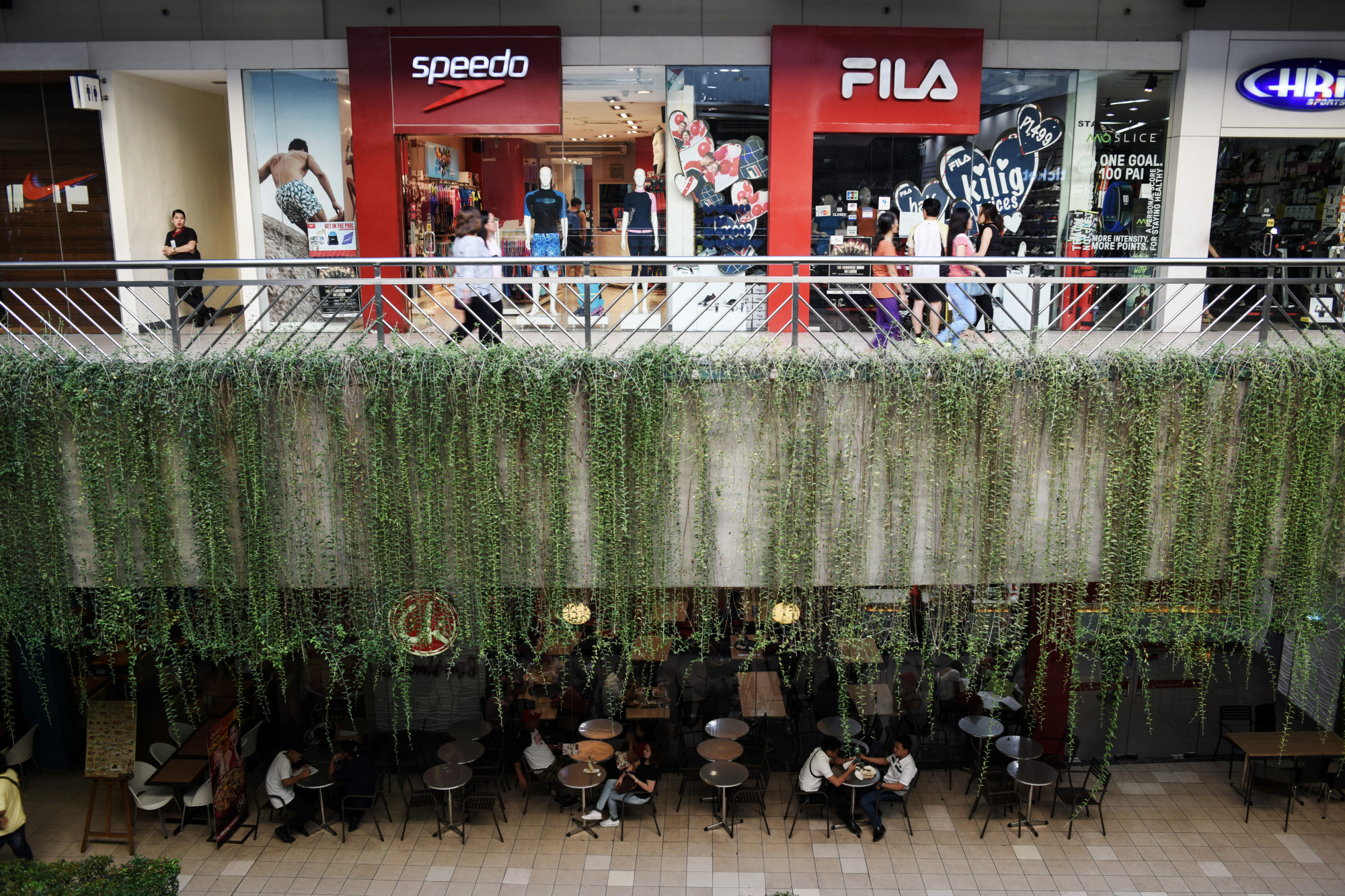 Visitors shop and dine at the SM Mall of Asia complex.