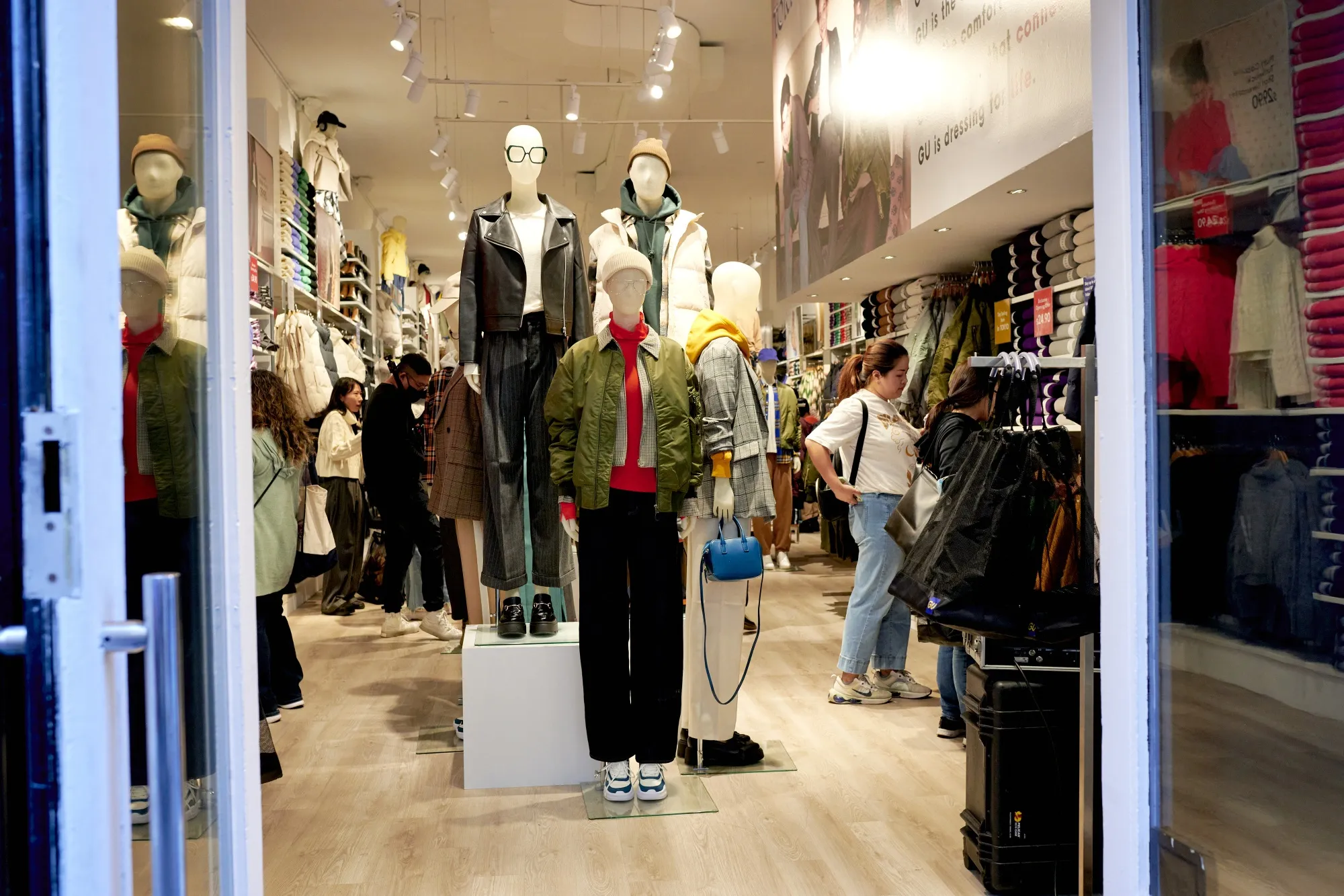 Customers shop at the GU Co. store in the SoHo neighborhood of New York.