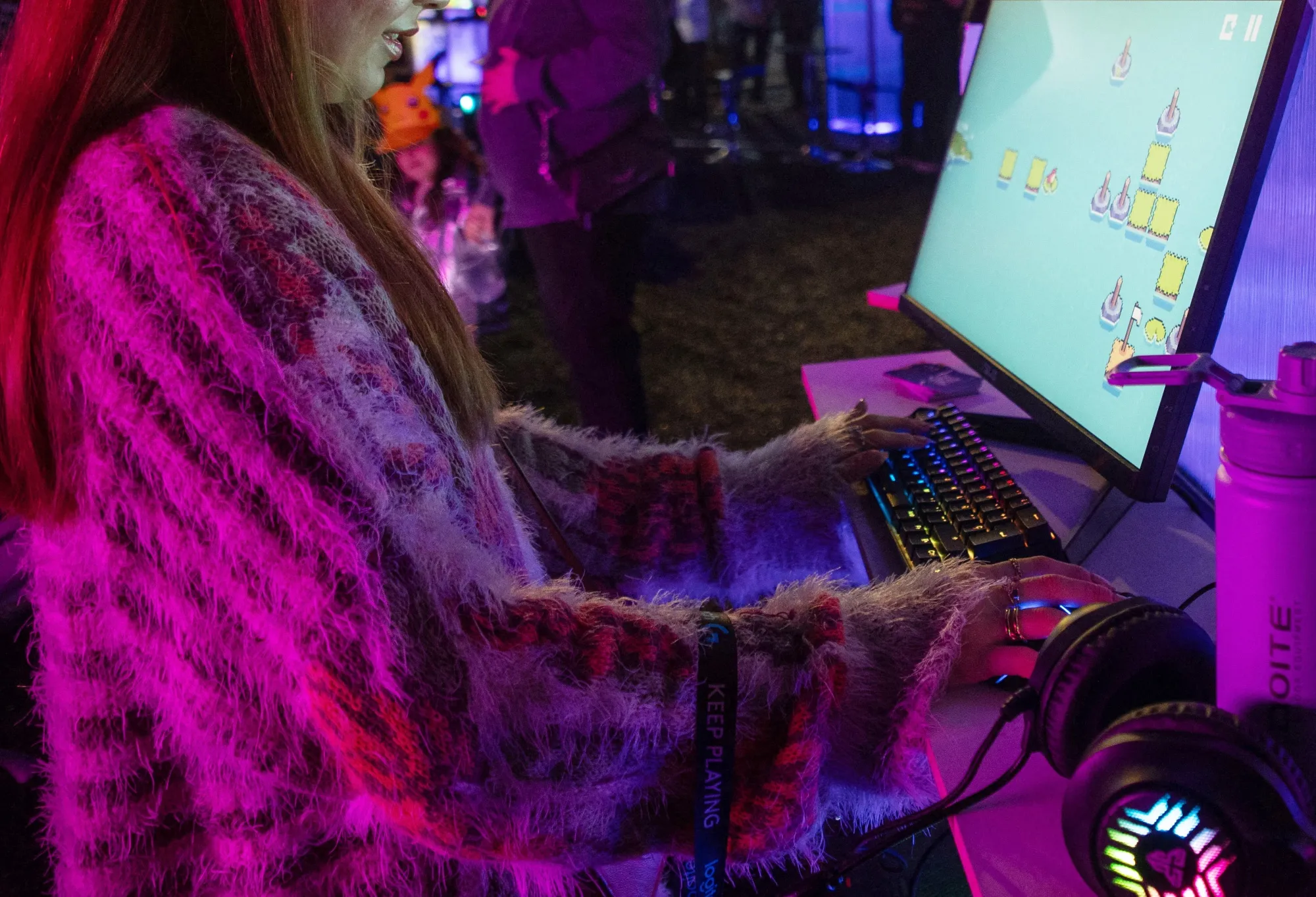 A woman plays at Plaza Gamer, an event that brings together video game developers and fans, in Santiago.