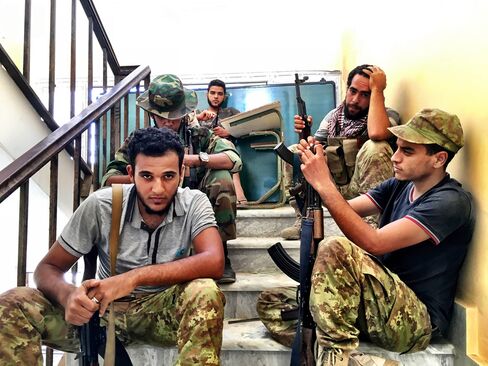 Fighters in a Misratan-led coalition rest near Neighborhood 3 on Sept. 5, 2016. Forces under the unity government have been battling to oust Islamic State fighters in Sirte since May.