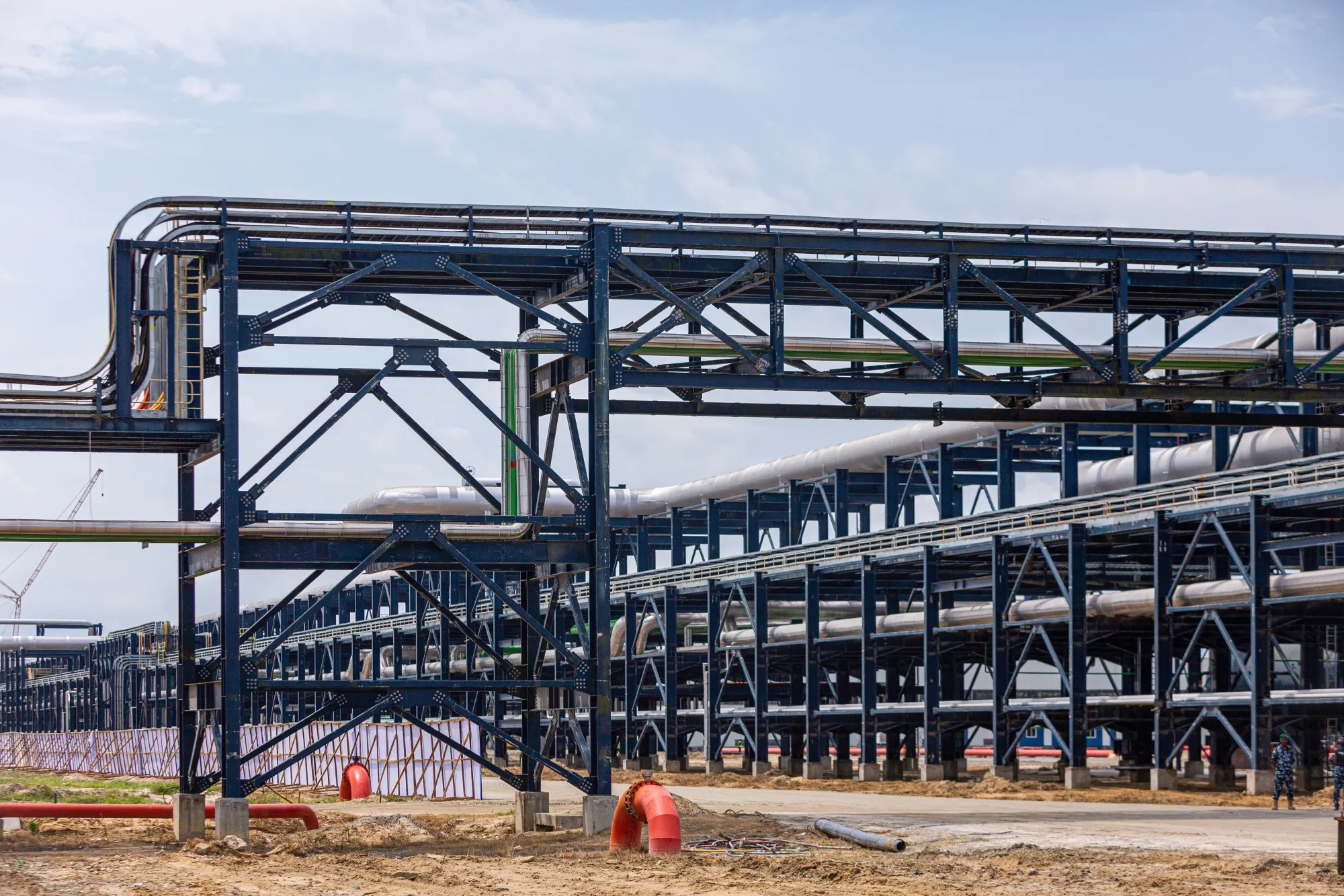 Pipelines at the Dangote Industries Ltd. oil refinery and fertilizer plant site in the Ibeju Lekki district of Lagos, Nigeria.
