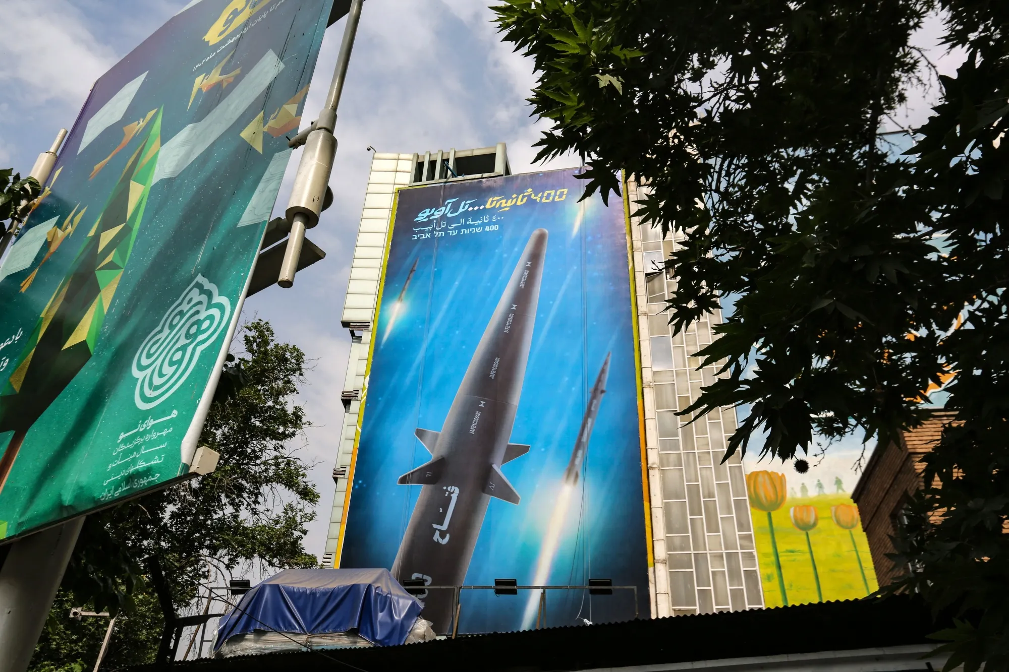 A billboard bearing a picture of a 'hypersonic missile in Tehran.