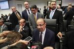 Khalid Al-Falih speaks to reporters ahead of the 175th OPEC meeting in Vienna on Dec. 6.