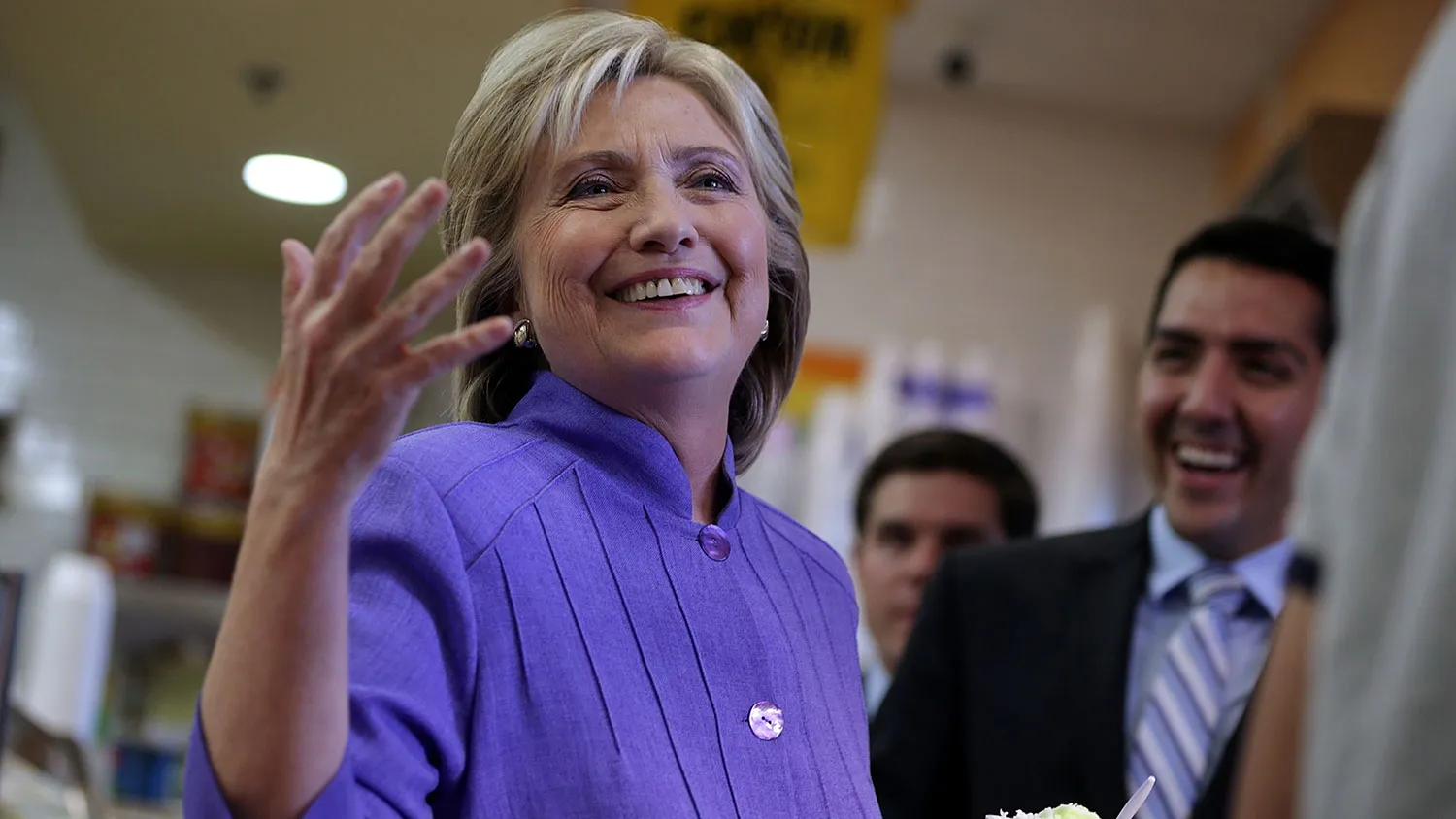 Democratic presidential hopeful Hillary Clinton reacts to questions from the media as she visits La Flor de Michoacan Ice Cream on Oct. 14, 2015, in Las Vegas, Nevada.
