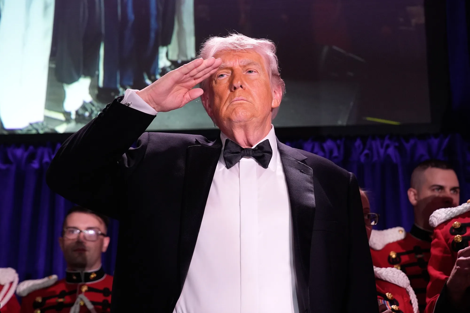 US President Donald Trump salutes during the White House Correspondents’ Association (WHCA) dinner in Washington, DC, US on Saturday, April 25, 2026.