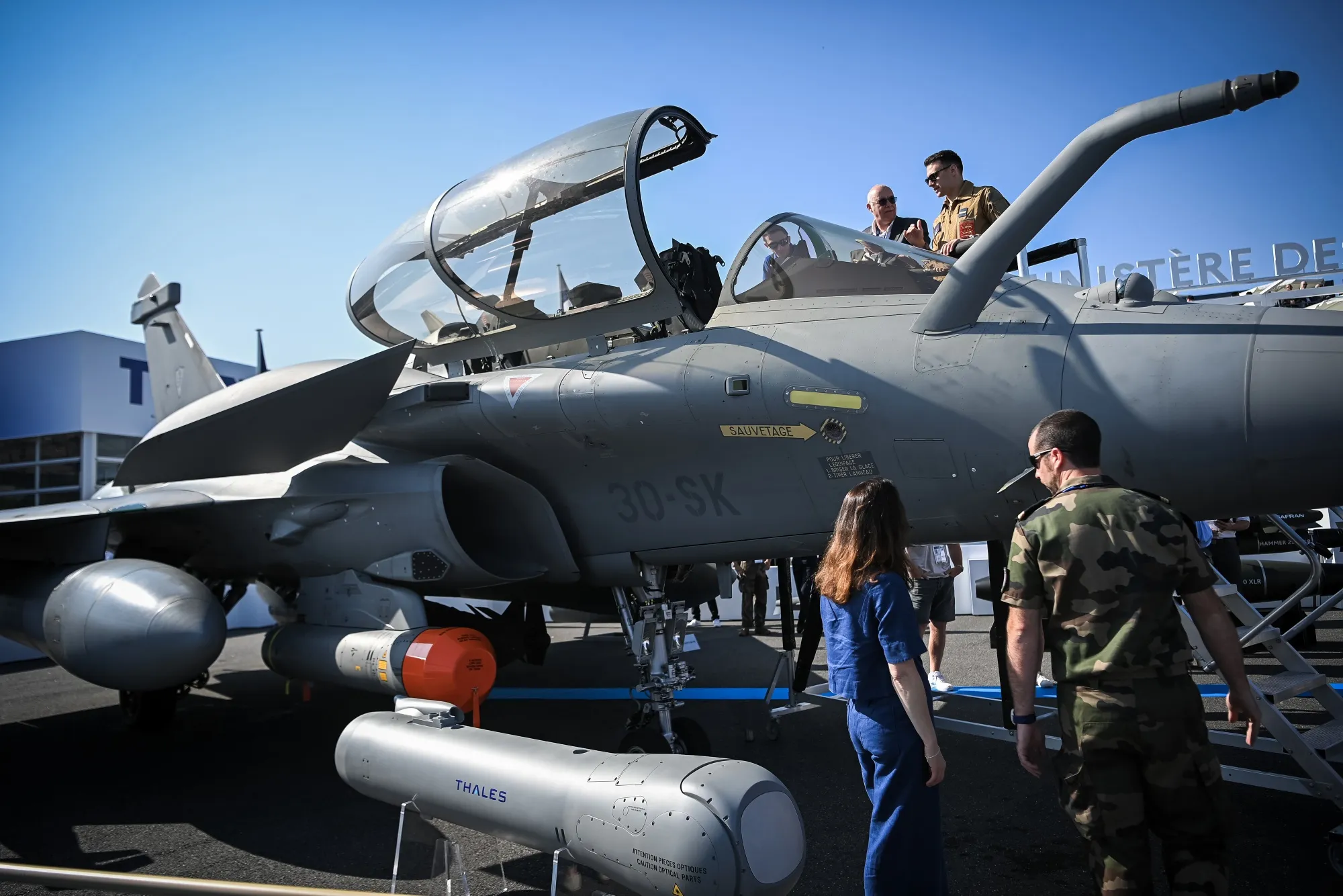 A Thales Talios targeting pod and a Dassault Rafale B fighter jet at the 2025 Paris Air Show.