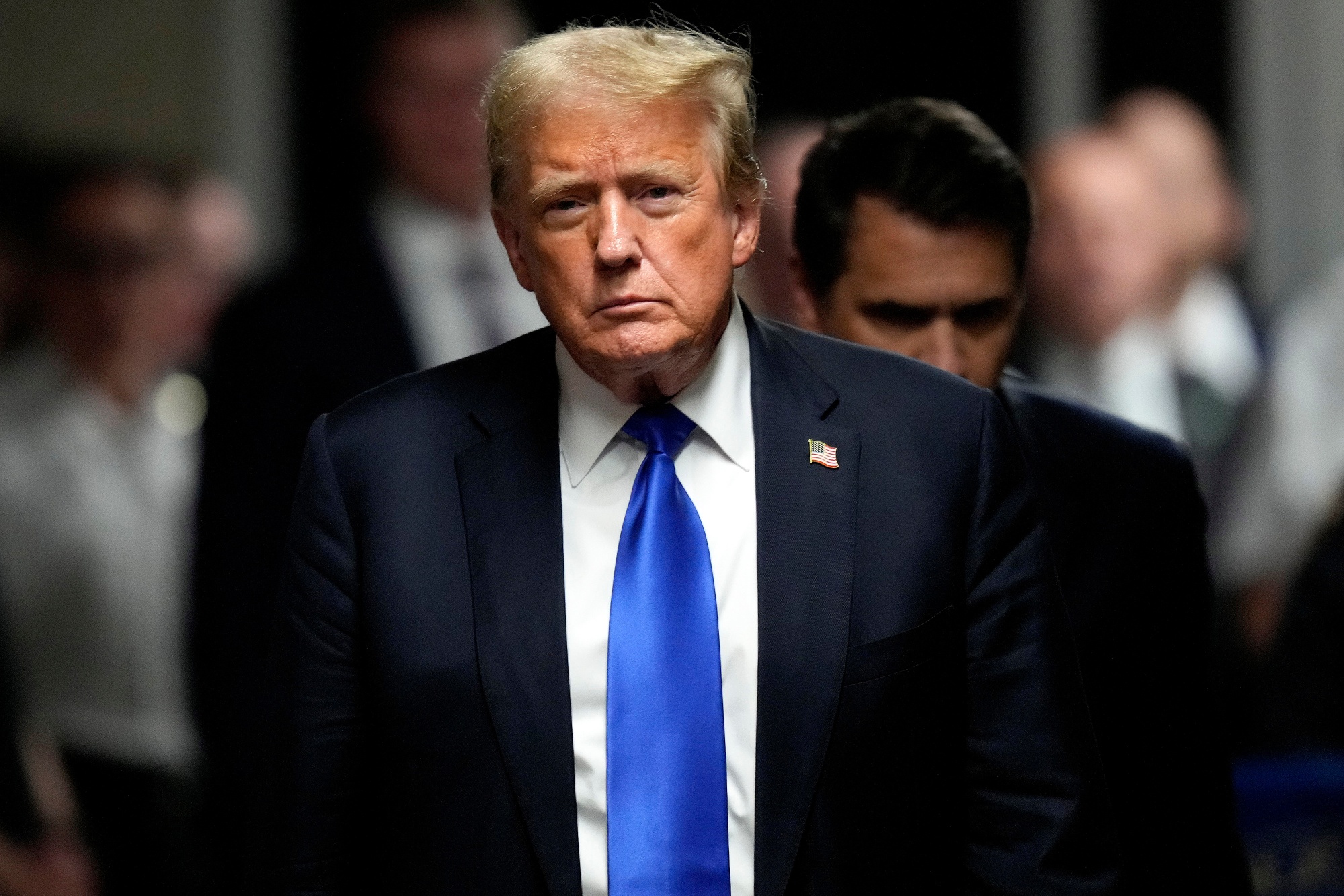 Donald Trump exits the courtroom after the verdict was read at Manhattan criminal court on May 30.