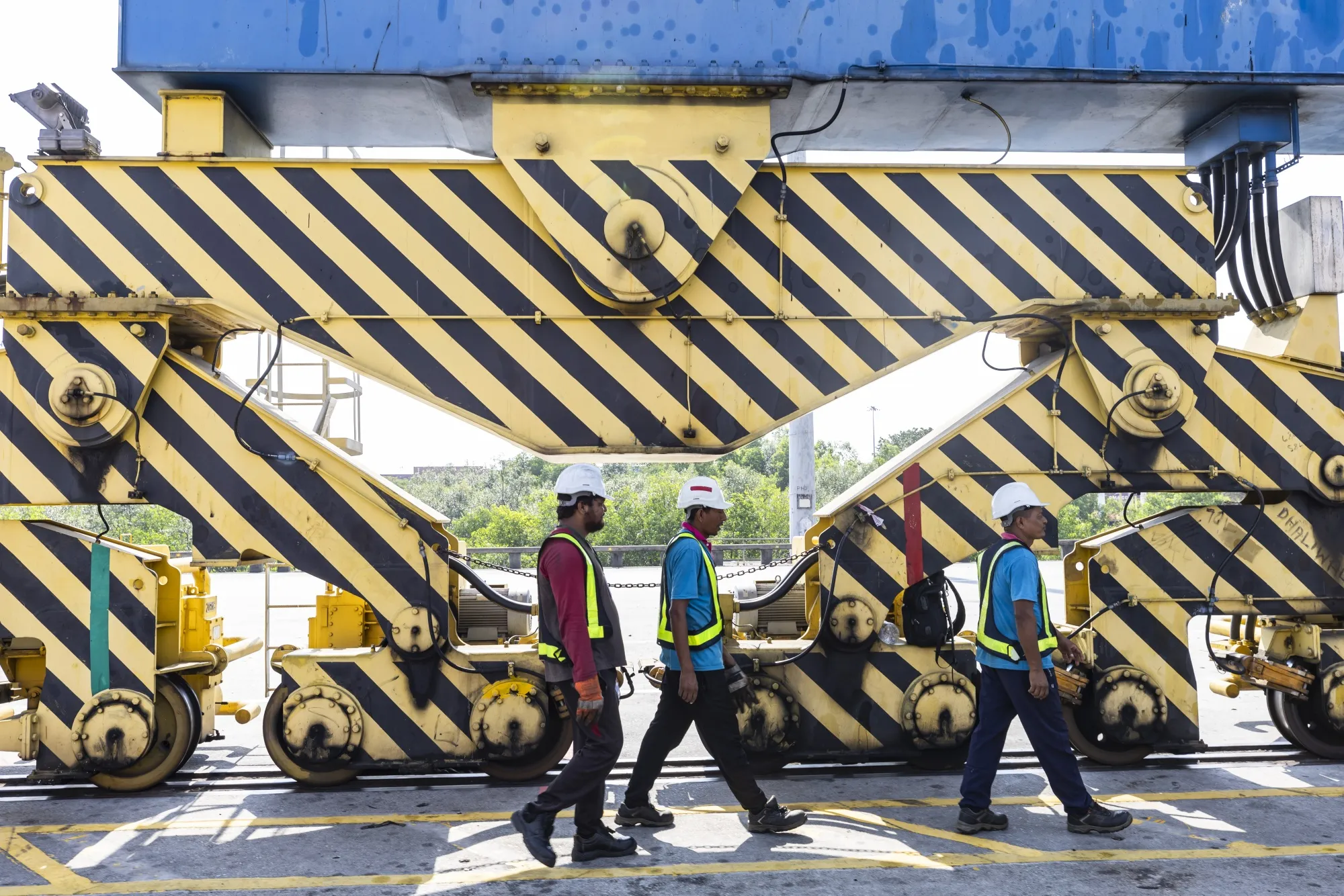 Workers at the Westport Holdings Bhd. port in Malaysia.