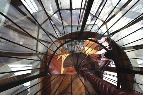 The centerpiece is a glass-topped observation tower.