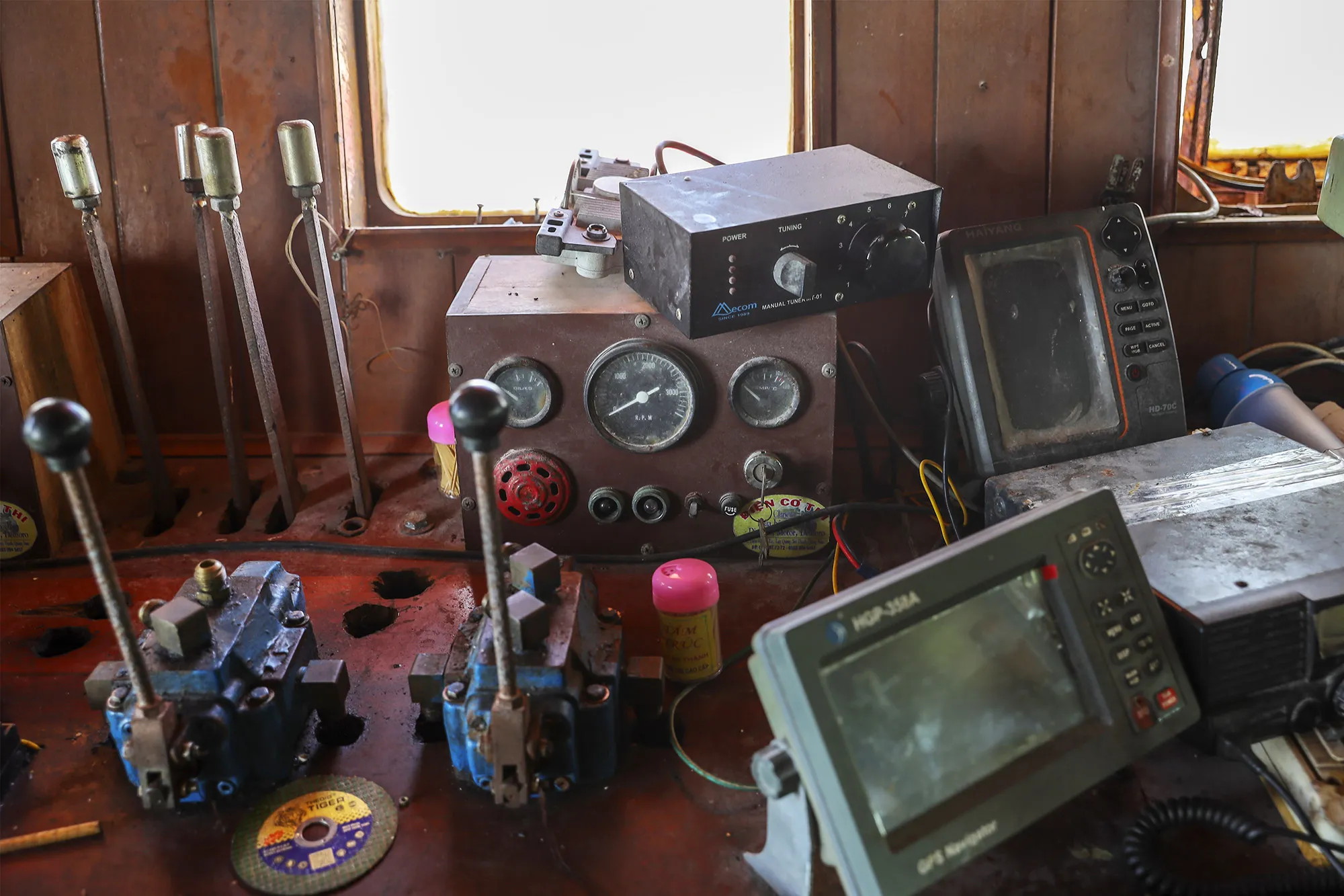 Navigation equipment sits in the cabin of a fishing trawler in Quang Nam, Vietnam, on Wednesday, June 26, 2019. Fishermen are on the front lines of Asia’s most complex territorial dispute, which involves six claimants and outside powers like the U.S. with an interest in protecting a waterway that carries more than $3 trillion in trade each year.
