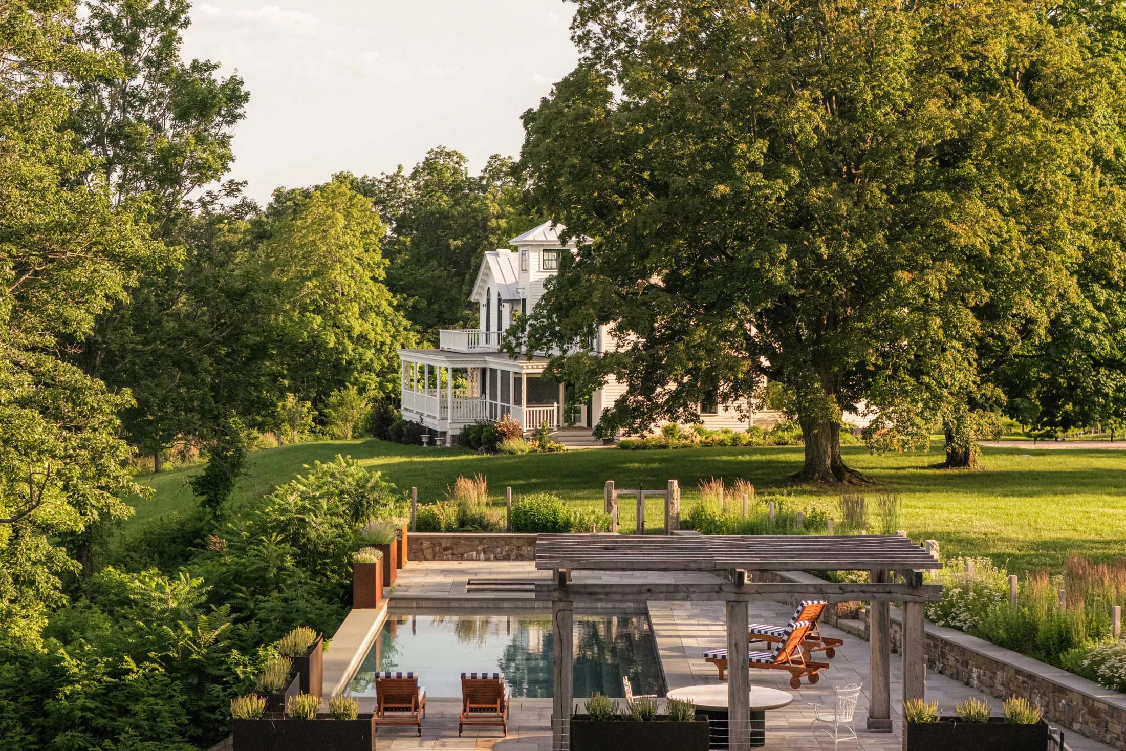 The new pool is tucked in alongside the house.