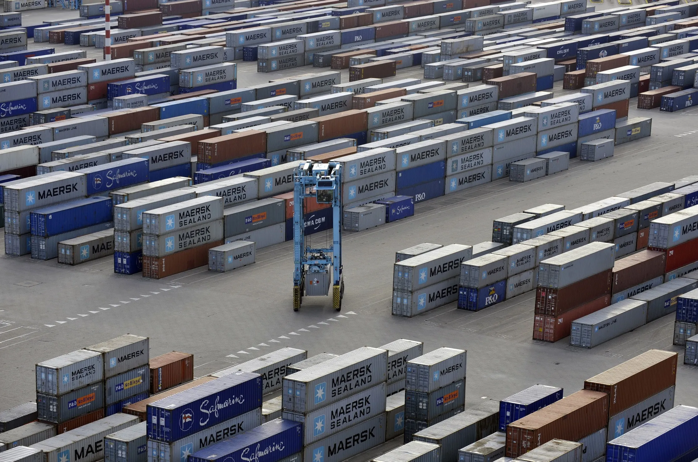 Maersk Containers And Ships At Port