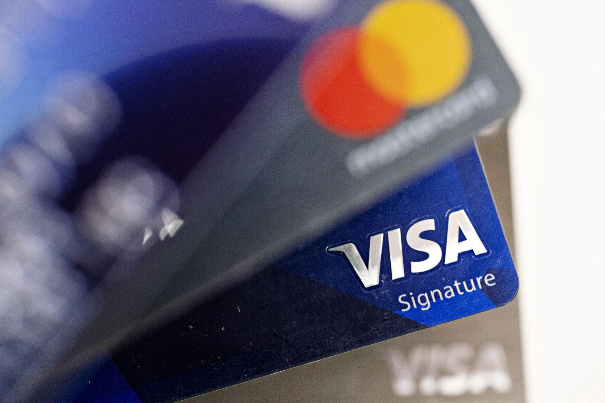 Credit-Card Swipe Fees: Behind Visa, Mastercard Agreement to Cap Fees ...