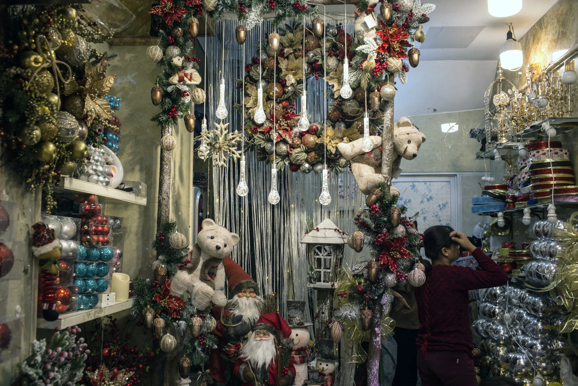 Christmas decorations are displayed at a store on Hang Ma street.