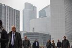 The Societe Generale SA headquarters, center, stand with other skyscrapers in the La Defense business district, Paris. 