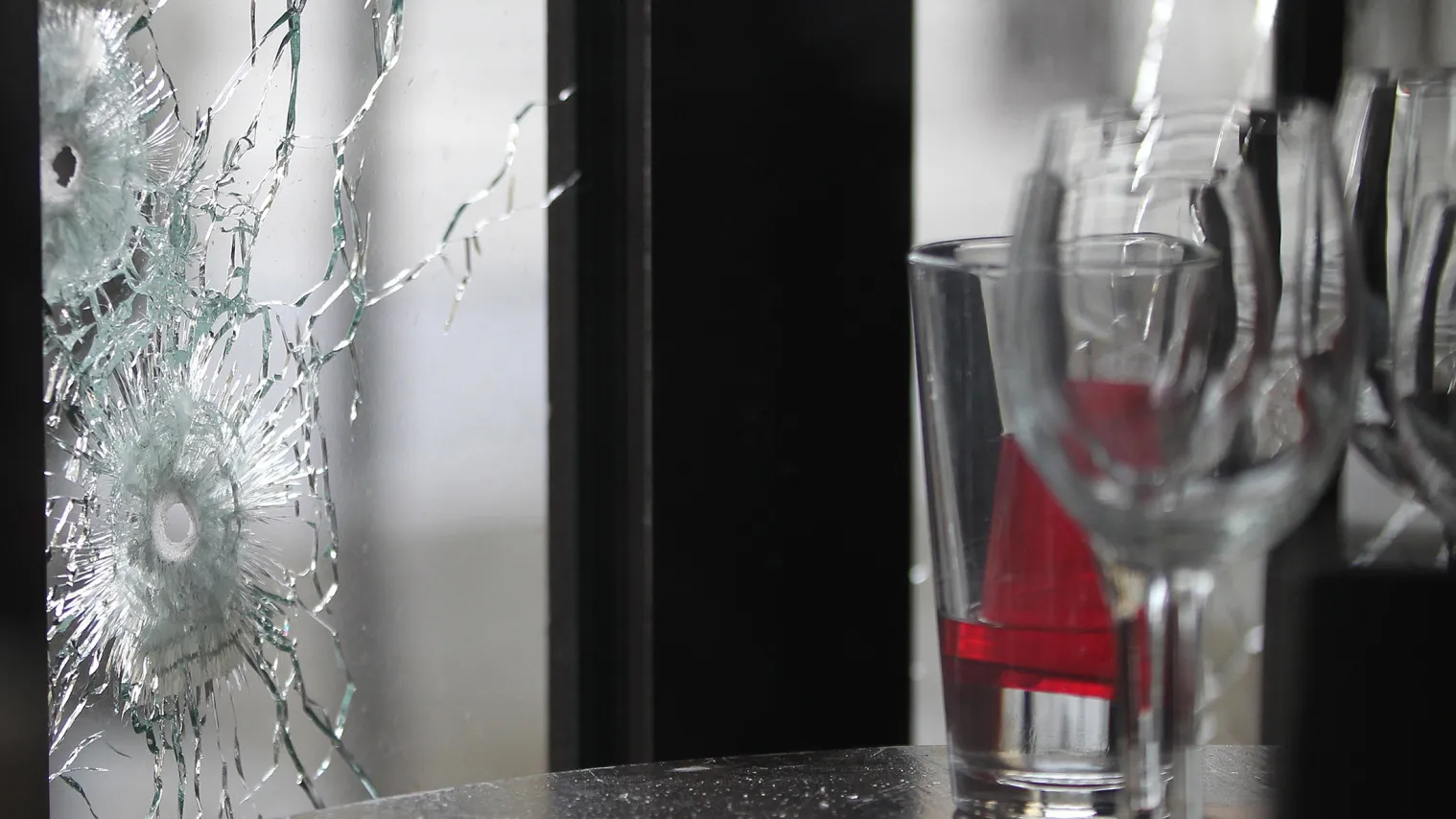 Bullet holes are seen as the French police takes security measures at Bataclan concert hall and 'La Belle Equipe' restaurant in 11th district of Paris, France.
