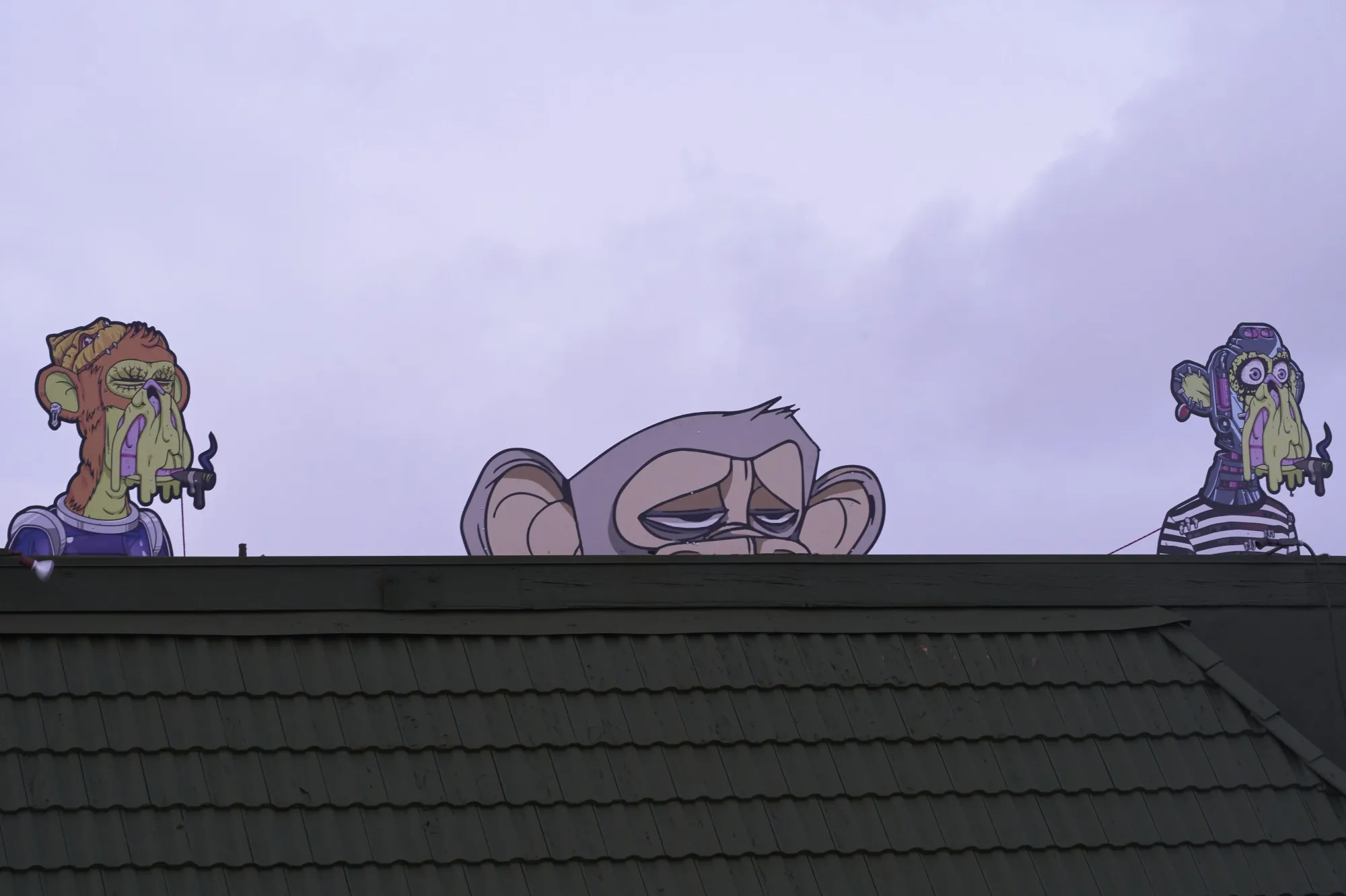 Bored Apes displayed at the Bored &amp; Hungry restaurant in Long Beach, California, U.S., on Thursday, April 21, 2022. Bored &amp; Hungry is a pop-up burger restaurant using art from the Bored Ape Yacht Club NFT collection for its branding.