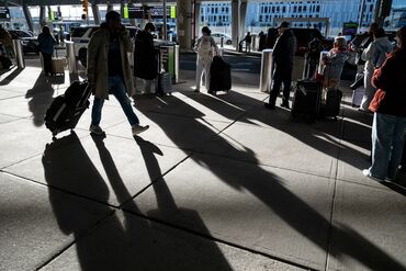 Travelers At Newark Airport Ahead Of Thanksgiving Holiday