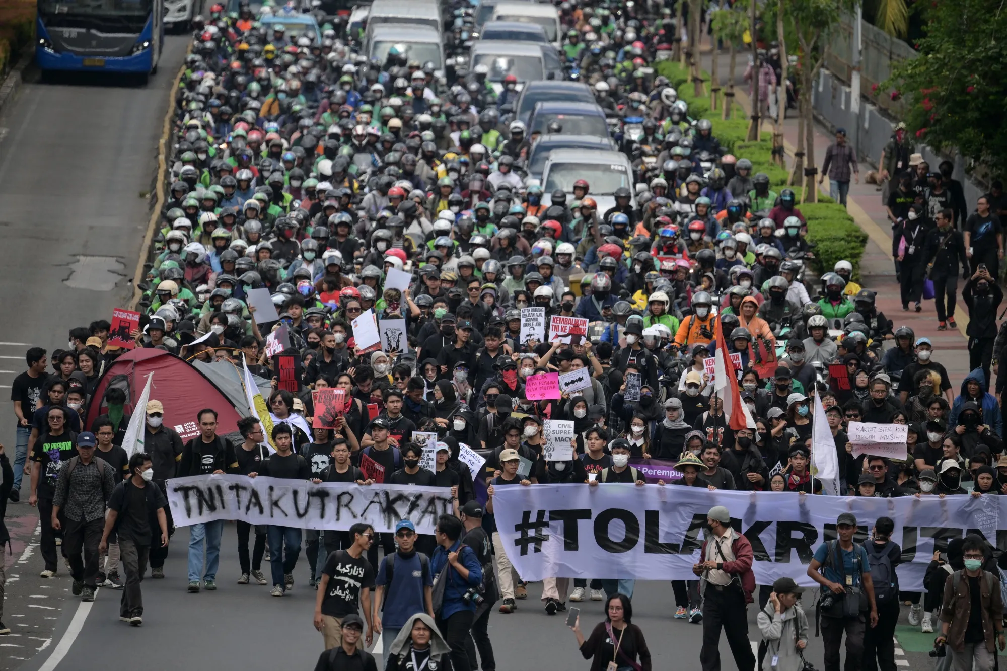 Students demonstrate against a revision to the armed forces law in Jakarta on March 20.
