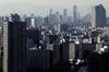 Commercial and residential buildings stand in Tokyo, Japan