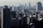 Commercial and residential buildings stand in Tokyo, Japan