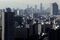 Commercial and residential buildings stand in Tokyo, Japan, on Wednesday, Jan. 27, 2016. Rich buyers taking advantage of record low borrowing costs have pushed prices in Tokyo beyond the reach of many ordinary buyers, taking the wind out of property sales. Photographer: Kiyoshi Ota/Bloomberg