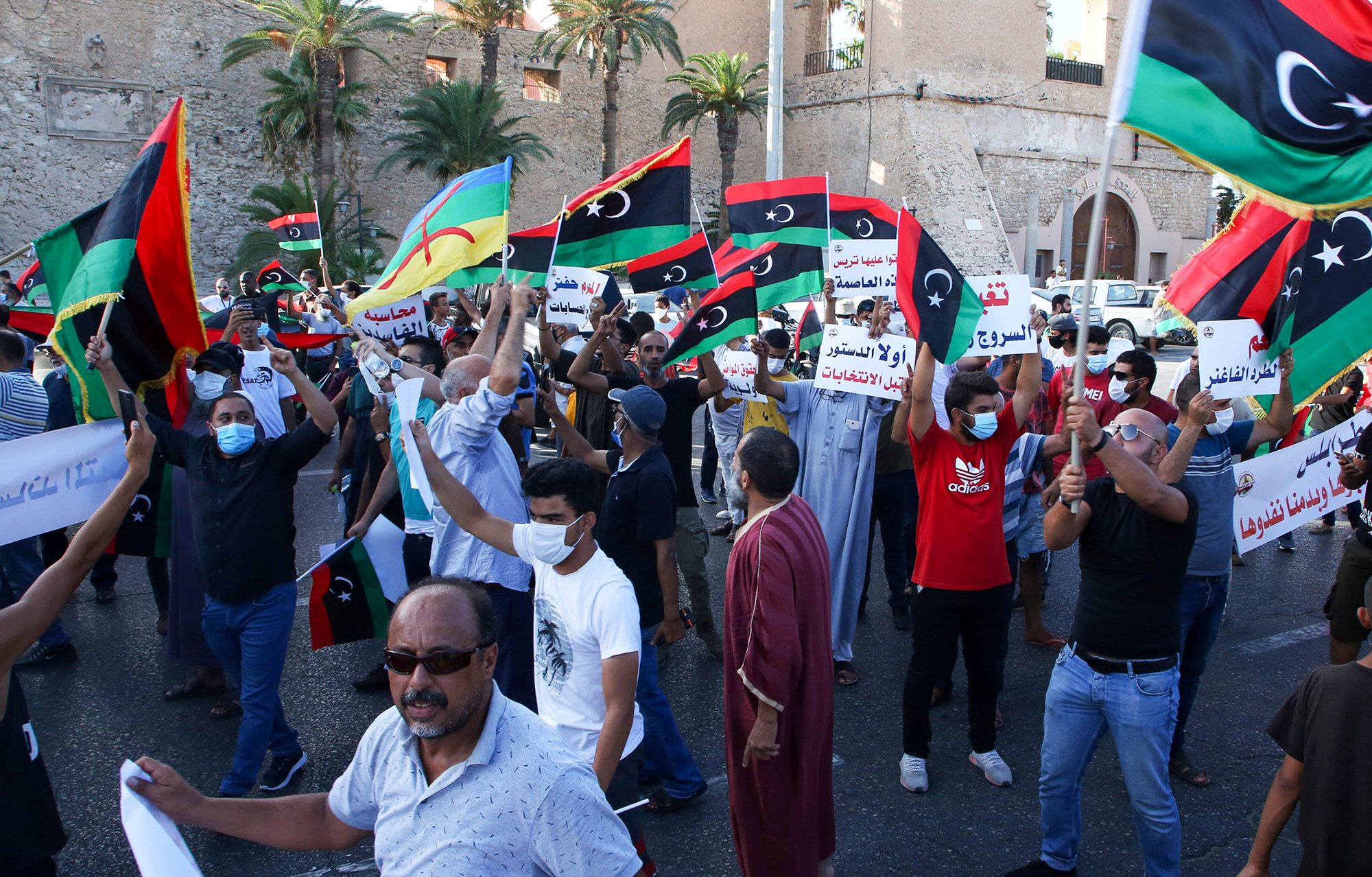 Libyans chant slogans during a demonstration at the Martyrs' Square in Tripoli on Aug. 25.