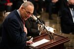Senate Majority Leader Chuck Schumer, a Democrat from New York, speaks during a ceremony for late Senator Bob Dole at the U.S. Capitol in Washington, D.C., U.S., on Thursday, Dec. 9, 2021.