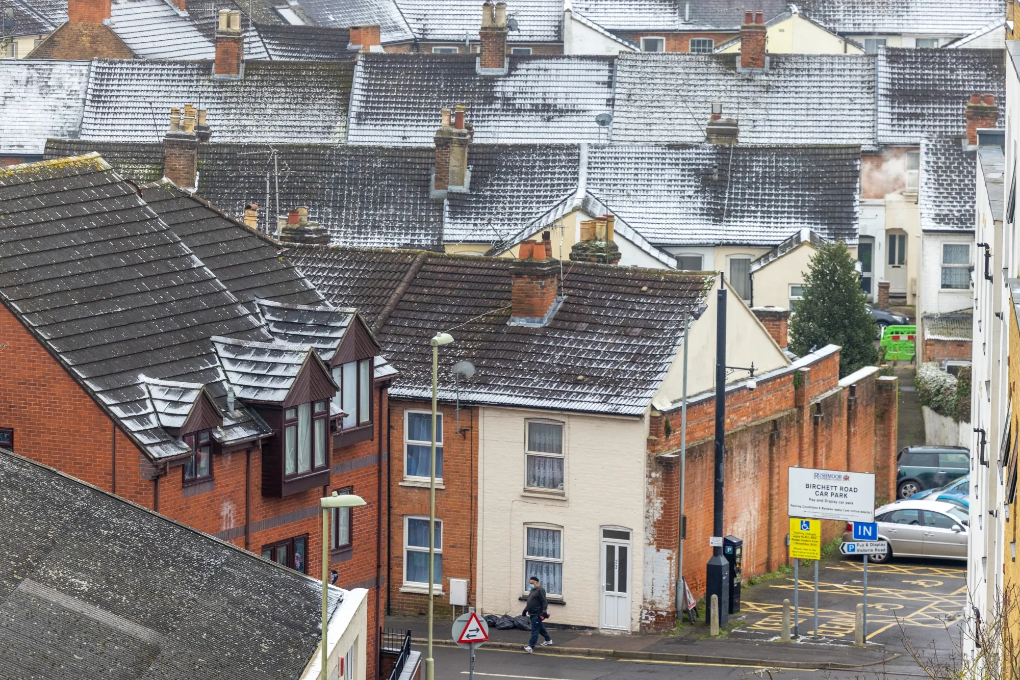 Snow-covered houses in Aldershot, UK.